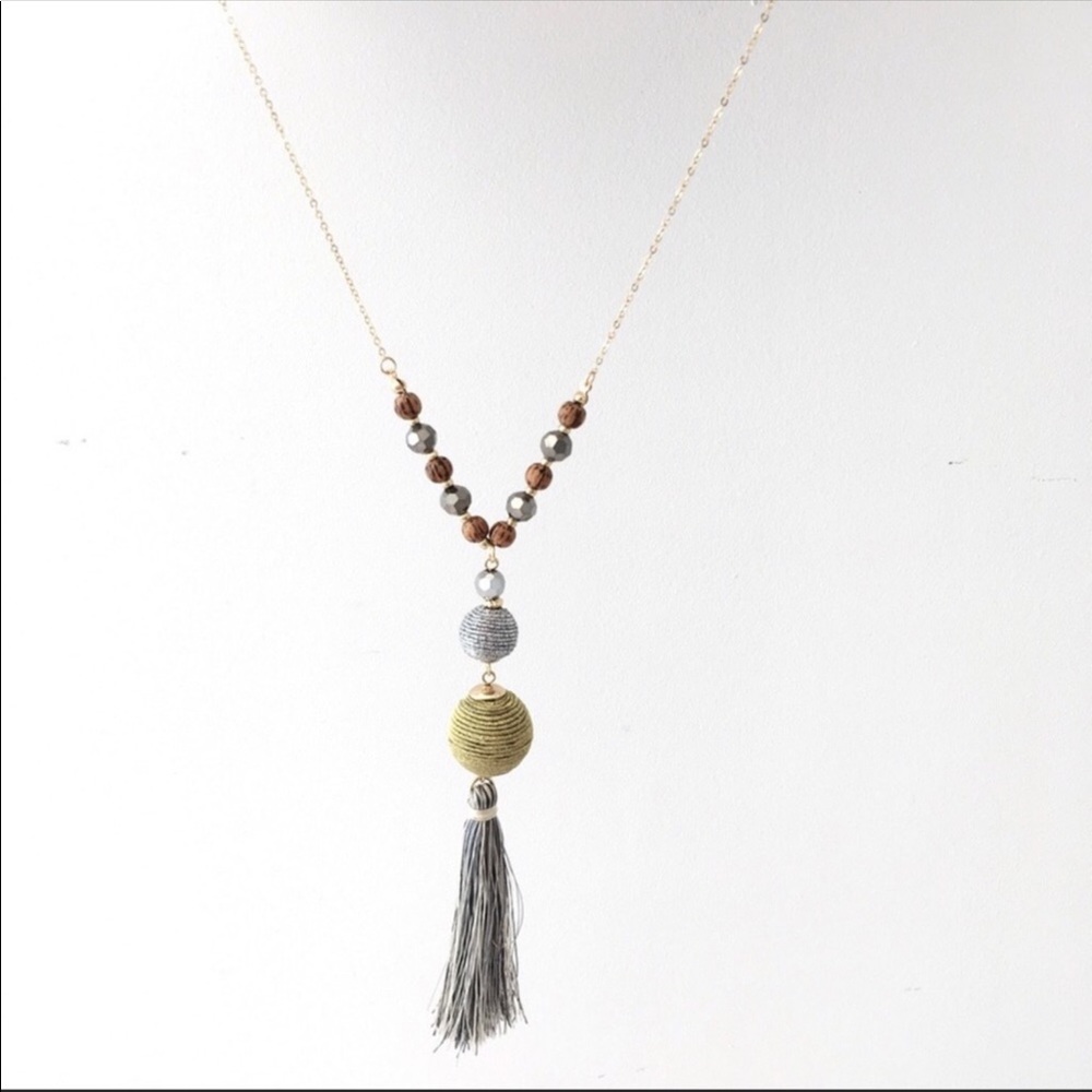 Beaded necklace fringe pendant.